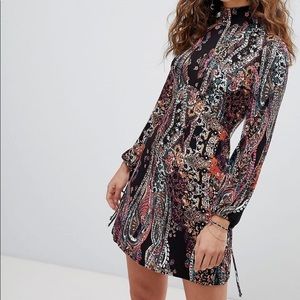 Free People All Dolled up paisley printed open back mini black dress size S
